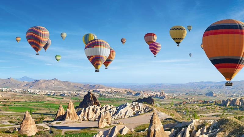 Many air balloons in the sky